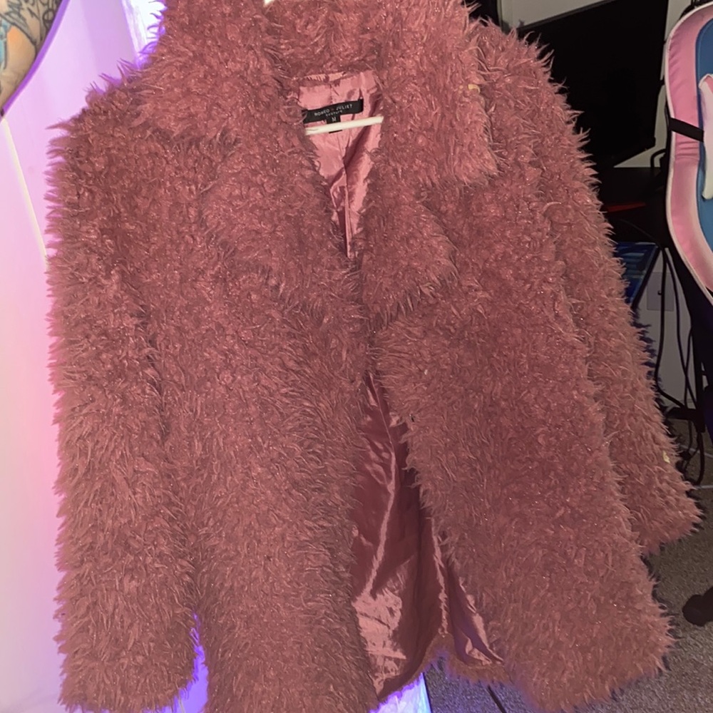 Fluffy salmon colored coat